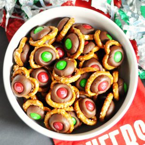 A fun treat for the holidays! Everyone is sure to love these M&M Kissed Pretzels!