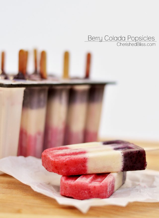 These Berry Colada Popsicles are perfect for Memorial Day Weekend or Forth of July because of their natural red, white, and blue beauty. When serving these fun popsicles you are sure to receive smiles for young to old!  