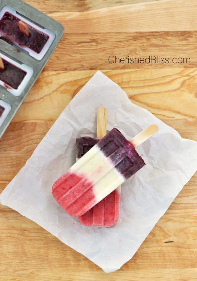  These Berry Colada Popsicles are perfect for Memorial Day Weekend or Forth of July because of their natural red, white, and blue beauty. When serving these fun popsicles you are sure to receive smiles for young to old! 
