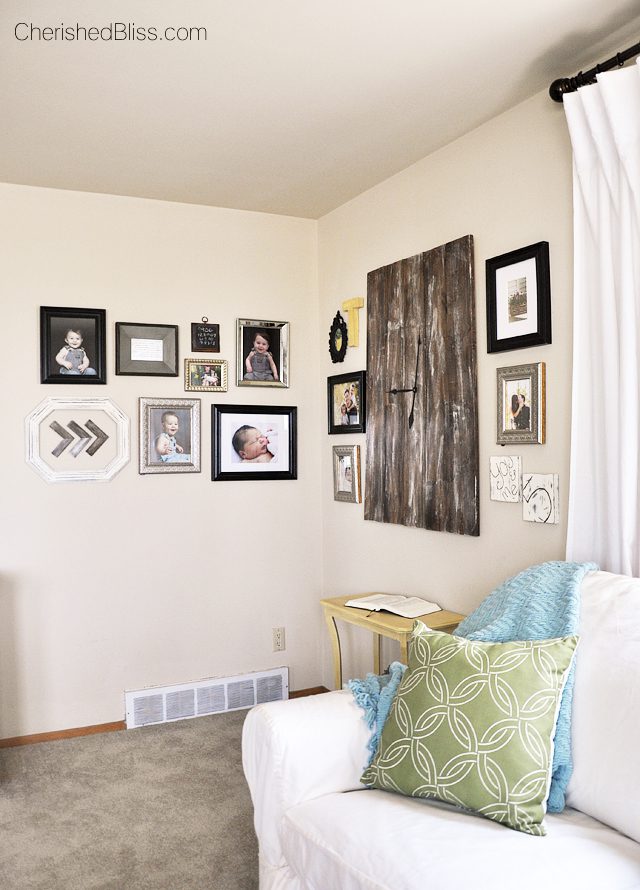 This DIY Corner Gallery Wall features an eclectic blend of frames and special memories! Click to see how it all comes together in this cozy cottage living room!