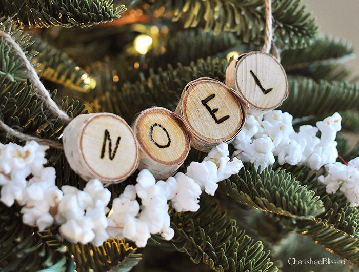 Enjoy these cute little banner style Wood Slice Noel Ornaments