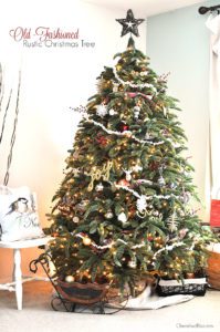 Adorned with Popcorn Garland and Rustic touches, this Old Fashioned Rustic Christmas Tree will bring your family together this Christmas Season!