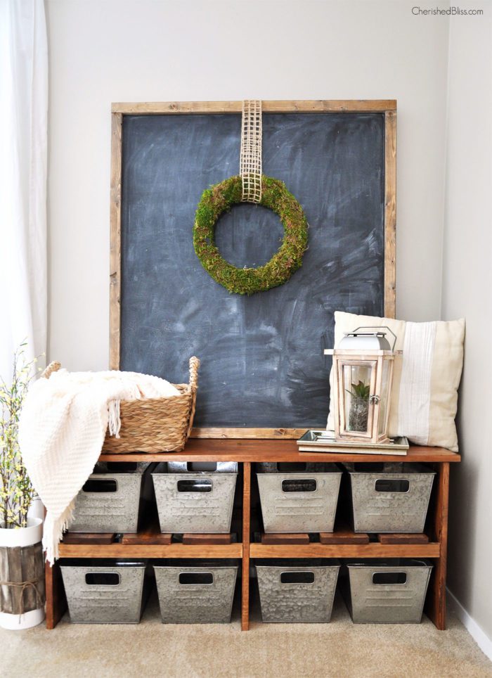 Love this Rustic Farmhouse Entryway! That bench, those bins! I want it all! 