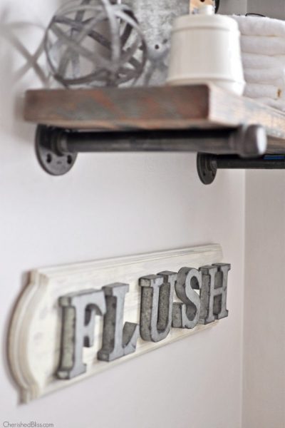Create this adorable DIY Industrial Farmhouse Bathroom Sign with this easy to follow tutorial!