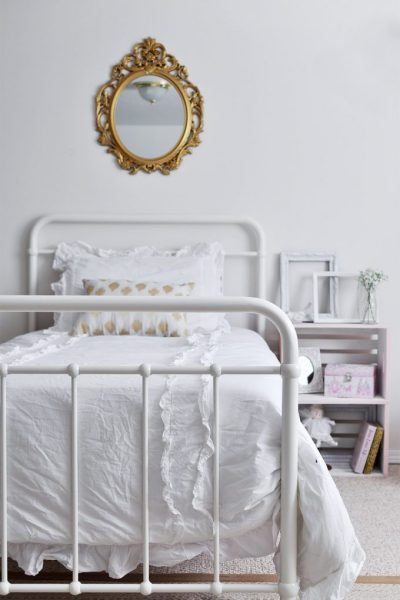 This gorgeous white Feminine Vintage Chic Bedroom is perfect for any little girl who wants to feel like a big girl with touches of pink and gold.