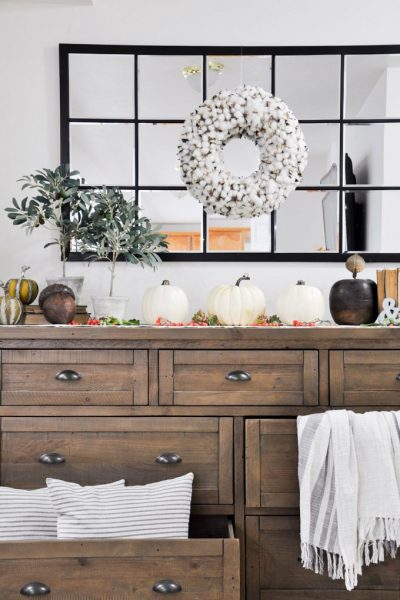 Create a beautiful space with these simple tips on creating a Welcoming Fall Entryway that can double as storage without sacrificing style!