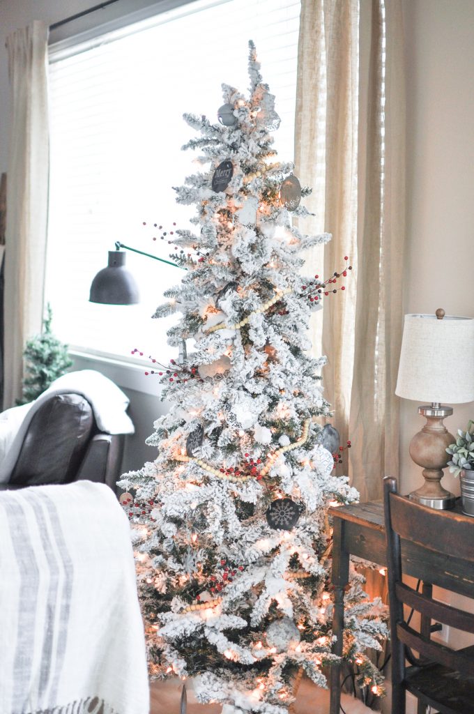 This beautiful Modern Farmhouse Christmas Tree was easily created with chalkboard and galvanized metal ornaments followed by a few hints of red. 