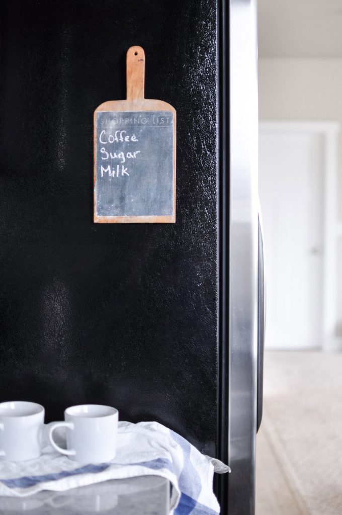 Never forget what you need at the store again with this farmhouse style Chalkboard Cutting Board. It's magnetic to keep it easily visible on your fridge! 