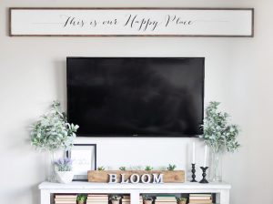 Learn how to build your own custom DIY Large Wooden Sign! With this tutorial you can use the Cricut Explore for your specific sign needs!