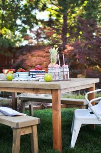 Give your kids an outdoor oasis with this easy to follow tutorial! Learn how to build this DIY Kids Outdoor Table and customize it to any style!