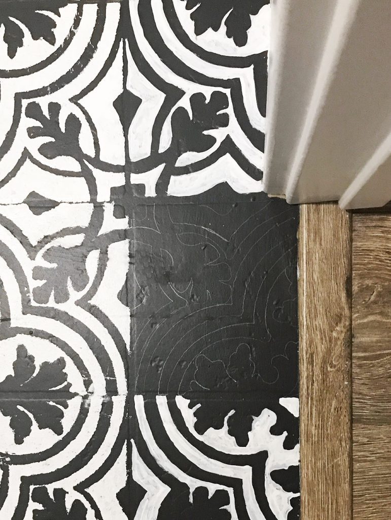 Got ugly Vinyl Floors? With this step by step tutorial you can learn how to Paint Vinyl Floors to look like the trendy cement tile everyone loves!