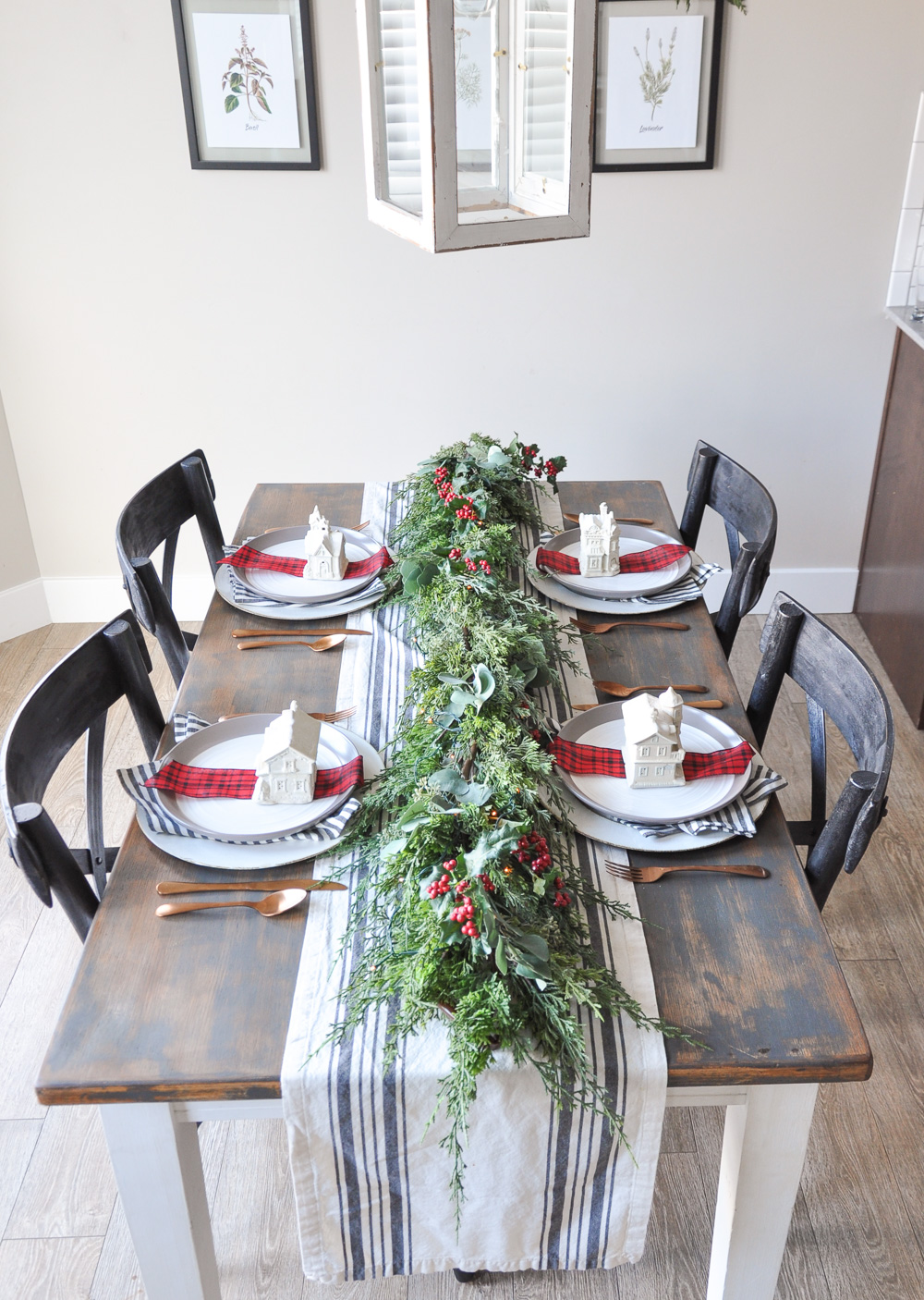 This unique Christmas Village Holiday Tablescape provides a simple way to bring a little Christmas Cheer to your home using things you likely have on hand! 