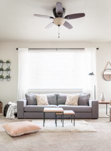 Trying to achieve a simpler feel in your home? This Minimalist Living Room makeover provides a clean look while still maintaining the cozy feel we all love in our homes!