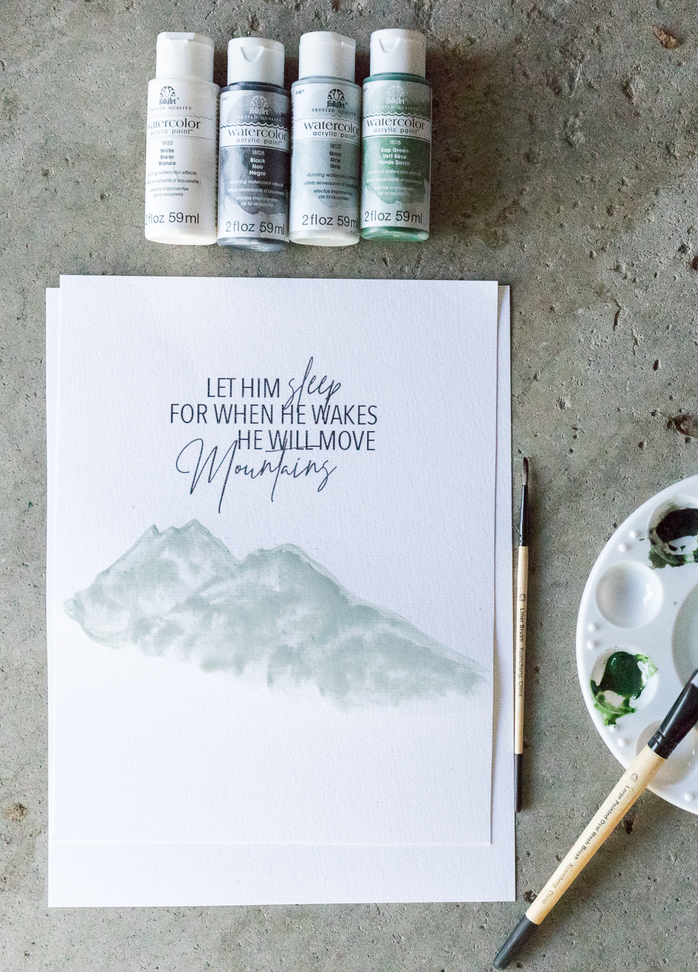  Learn how to create this adorable artwork for your boys room using this Mountain Watercolor Tutorial combined with this adorable printable quote. 