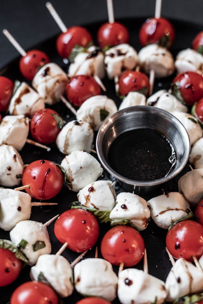 Fresh Caprese Salad Skewers make the perfect appetizer when drizzled in a balsamic reduction. 