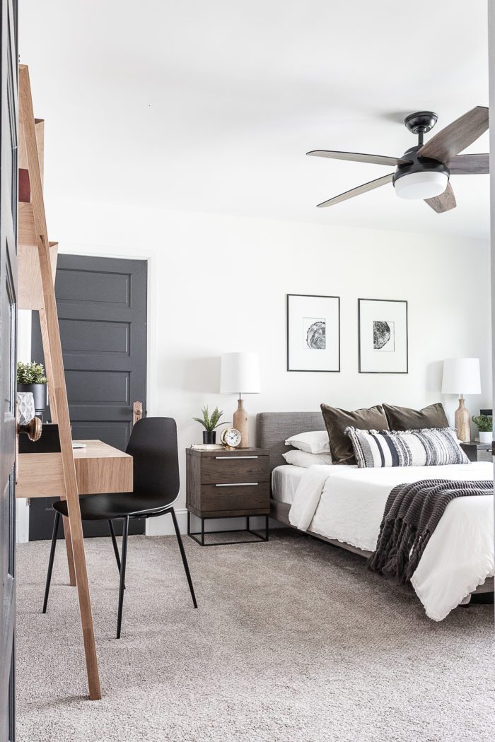 Take a tour of this Cozy Modern Scandinavian Master Bedroom with a light airy feel and high contrast decor.