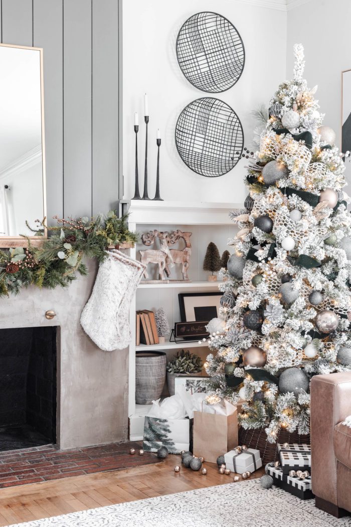 Neutral Modern Cozy Christmas Tree in living room next to built ins. #cherishedbliss #ChristmasTree